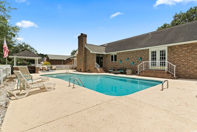 218 Lander Dr, Conway, SC 29526 - view of pool featuring a patio area, entry steps, french doors, and a gazebo