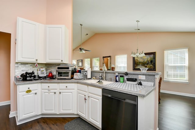 434 Deerfield Links Dr, Surfside Beach, SC 29575 - kitchen with stainless steel dishwasher, a peninsula, dark wood-style floors, backsplash, and white cabinets