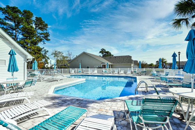 434 Deerfield Links Dr, Surfside Beach, SC 29575 - community pool featuring a patio and outdoor dining space