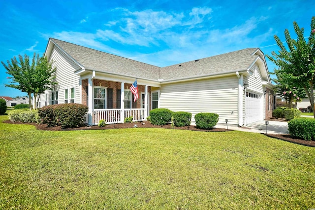 434 Deerfield Links Dr, Surfside Beach, SC 29575 - single story home featuring covered porch, a front lawn, a garage, and brick siding