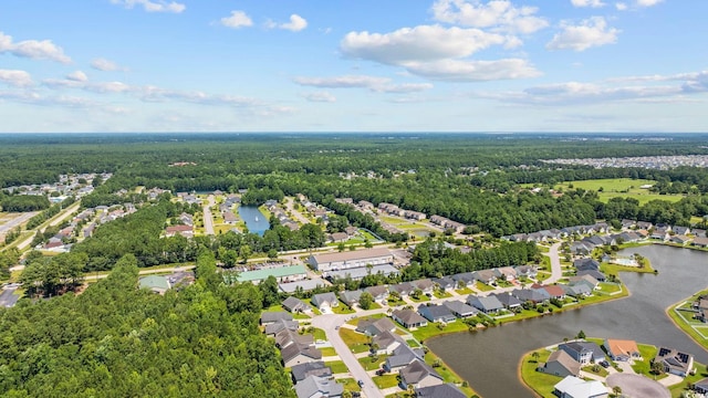371 Sea Turtle Dr, Myrtle Beach, SC 29588 - aerial view of residential area featuring a heavily wooded area and a large body of water