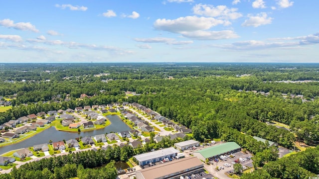 371 Sea Turtle Dr, Myrtle Beach, SC 29588 - aerial view of residential area with a heavily wooded area and a large body of water