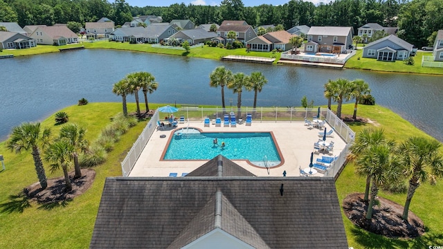 371 Sea Turtle Dr, Myrtle Beach, SC 29588 - aerial perspective of suburban area with a large body of water and a pool area