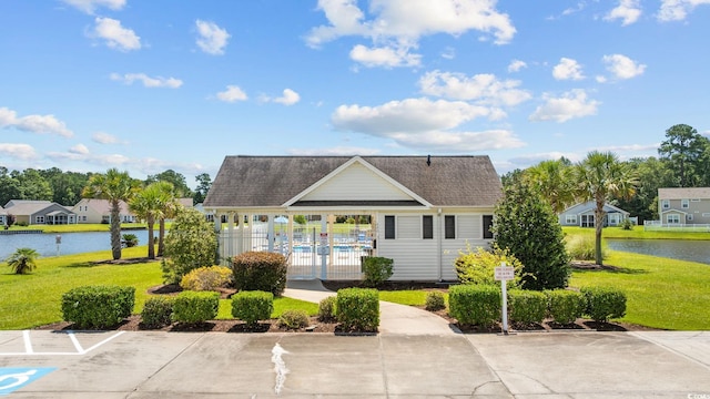 371 Sea Turtle Dr, Myrtle Beach, SC 29588 - view of property with a water view, a residential view, and uncovered parking