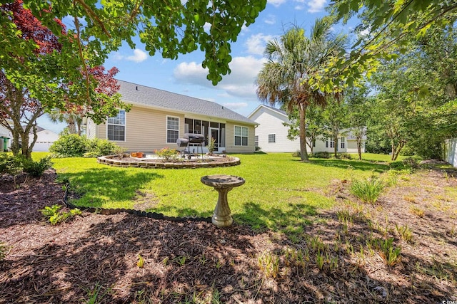 371 Sea Turtle Dr, Myrtle Beach, SC 29588 - back of house with a lawn and a patio area