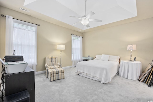 371 Sea Turtle Dr, Myrtle Beach, SC 29588 - carpeted bedroom featuring multiple windows and a ceiling fan