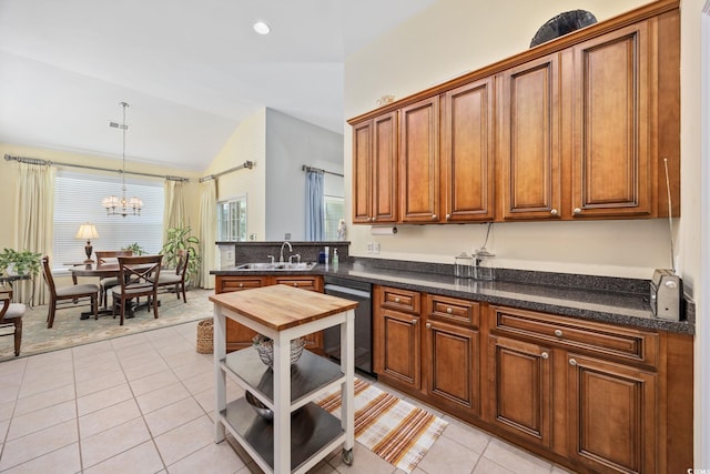 371 Sea Turtle Dr, Myrtle Beach, SC 29588 - kitchen with vaulted ceiling, dishwasher, light tile patterned floors, brown cabinetry, and a chandelier