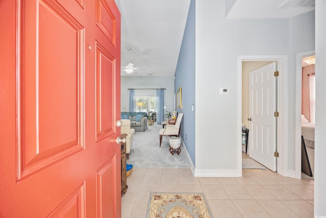 371 Sea Turtle Dr, Myrtle Beach, SC 29588 - entryway featuring light tile patterned floors and light carpet