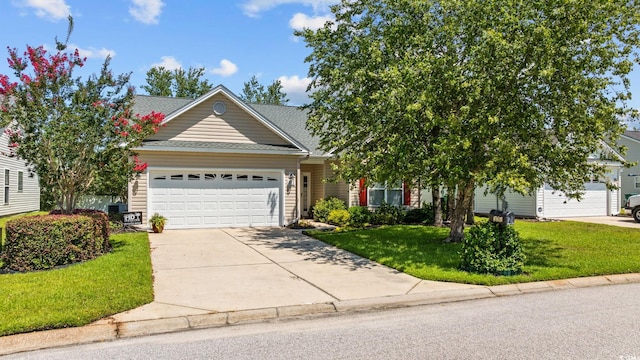 371 Sea Turtle Dr, Myrtle Beach, SC 29588 - view of front facade featuring an attached garage, a front lawn, and driveway