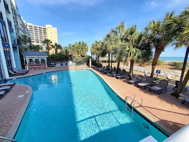 6804 N Ocean Blvd Unit 1621, Myrtle Beach, SC 29572 - community pool featuring a patio area