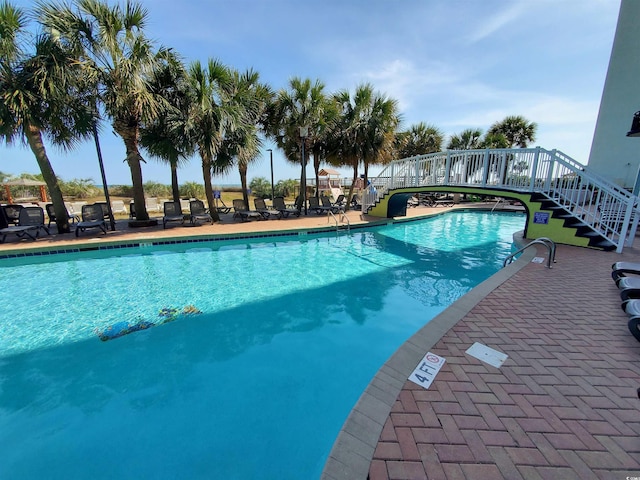6804 N Ocean Blvd Unit 1621, Myrtle Beach, SC 29572 - community pool with stairway and a patio area