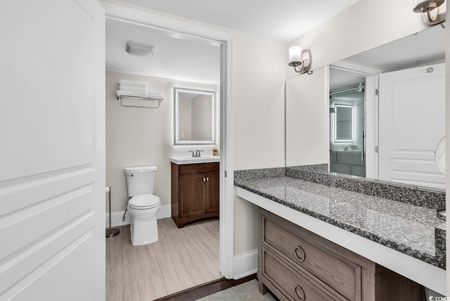 2701 S Ocean Blvd Unit 705, North Myrtle Beach, SC 29582 - bathroom featuring vanity and toilet