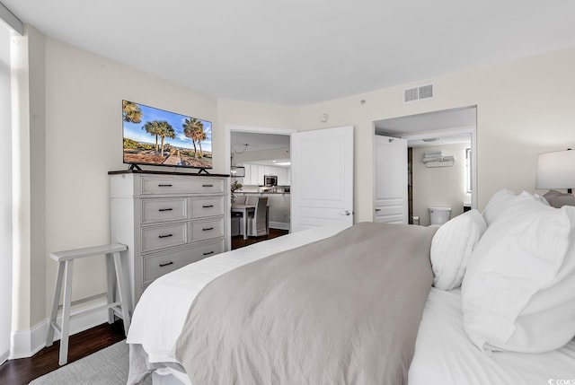 2701 S Ocean Blvd Unit 705, North Myrtle Beach, SC 29582 - bedroom with dark wood finished floors and baseboards