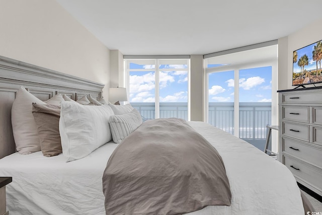 2701 S Ocean Blvd Unit 705, North Myrtle Beach, SC 29582 - bedroom with access to outside