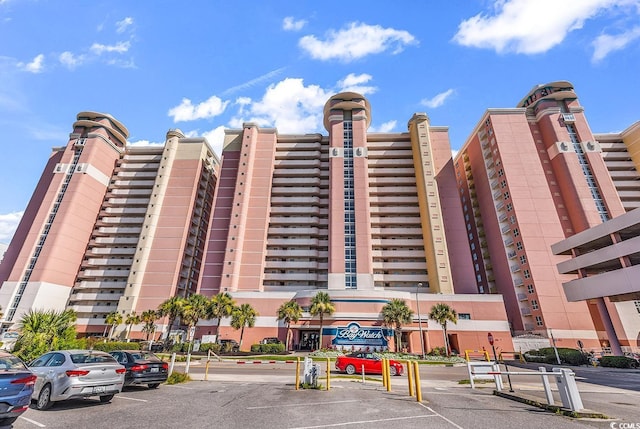 2701 S Ocean Blvd Unit 705, North Myrtle Beach, SC 29582 - view of building exterior featuring uncovered parking