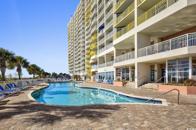 2701 S Ocean Blvd Unit 705, North Myrtle Beach, SC 29582 - community pool featuring a patio