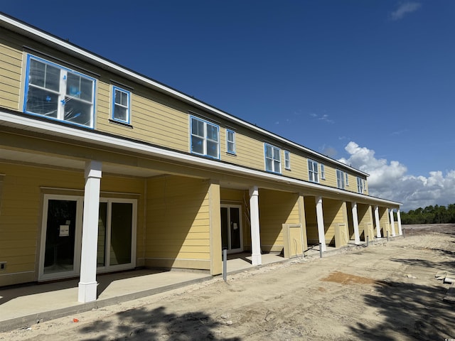 6876 Water Tower Rd Unit 101, Longs, SC 29568 - rear view of house featuring a patio area