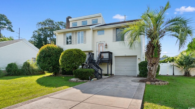 503 Plantation Dr, Surfside Beach, SC 29575 - view of front of property featuring a garage and driveway