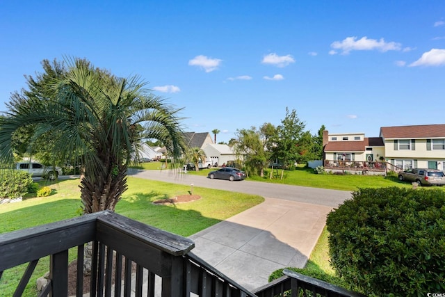 503 Plantation Dr, Surfside Beach, SC 29575 - view of grassy yard featuring a residential view