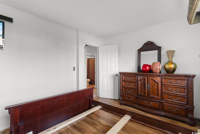 503 Plantation Dr, Surfside Beach, SC 29575 - bedroom featuring wood finished floors