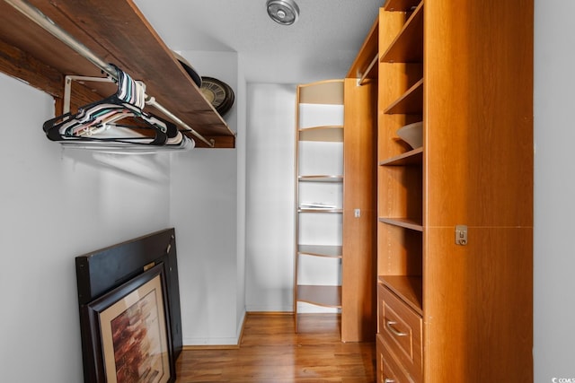 503 Plantation Dr, Surfside Beach, SC 29575 - walk in closet featuring wood finished floors