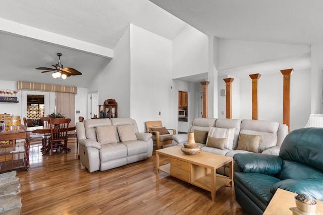 503 Plantation Dr, Surfside Beach, SC 29575 - living area featuring ceiling fan, light wood-type flooring, ornate columns, and high vaulted ceiling
