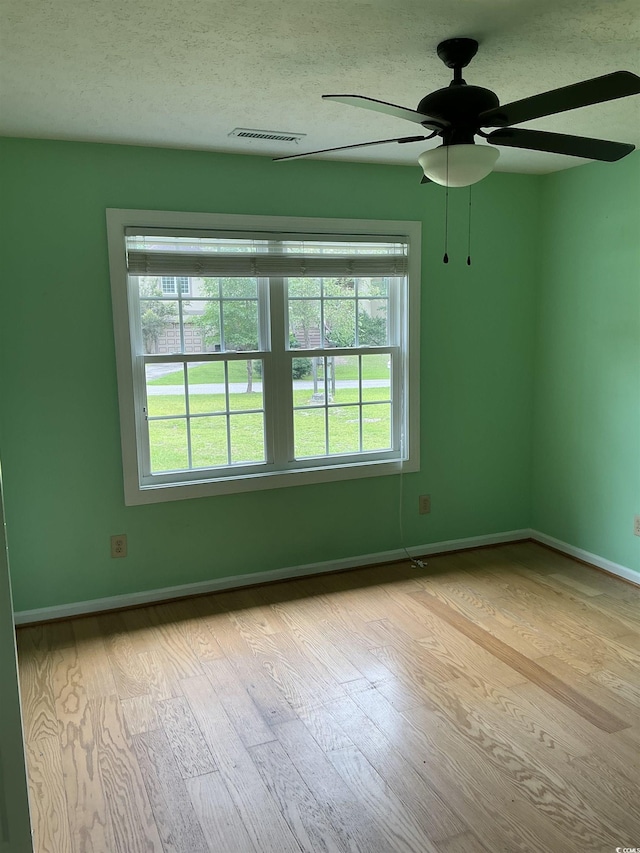 983 Nottingham Lakes Rd, Conway, SC 29526 - empty room featuring wood finished floors and a ceiling fan