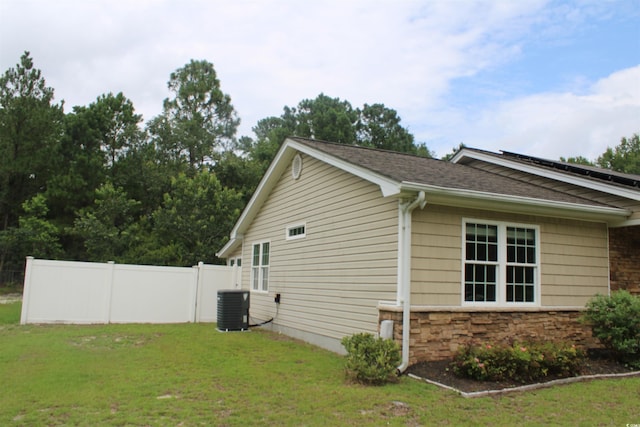 983 Nottingham Lakes Rd, Conway, SC 29526 - view of home's exterior featuring a cooling unit and stone siding