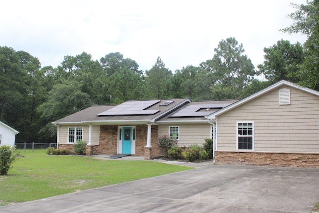 983 Nottingham Lakes Rd, Conway, SC 29526 - view of front facade with stone siding and solar panels
