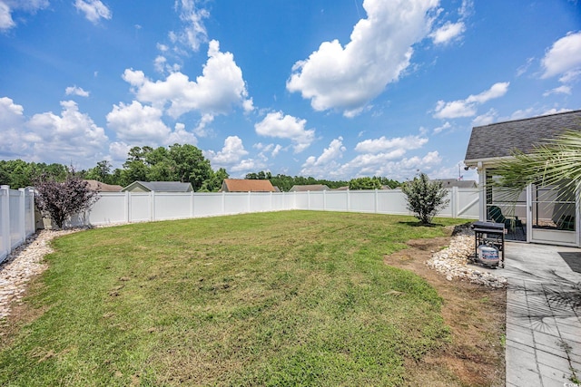 308 Millbrook Cir, Aynor, SC 29544 - fenced backyard featuring a patio area