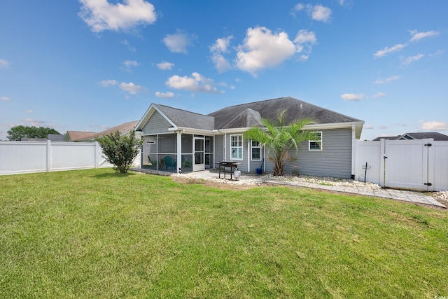 308 Millbrook Cir, Aynor, SC 29544 - rear view of house featuring a gate, a sunroom, a fenced backyard, and a patio area