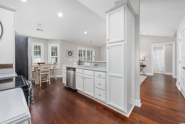 308 Millbrook Cir, Aynor, SC 29544 - kitchen with lofted ceiling, appliances with stainless steel finishes, dark wood-style floors, light countertops, and white cabinets