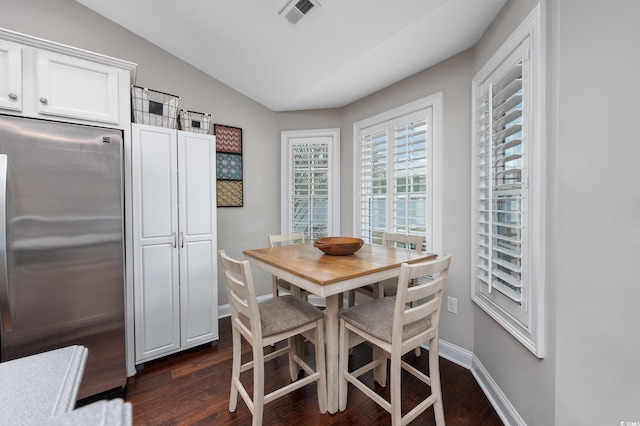 308 Millbrook Cir, Aynor, SC 29544 - dining room featuring dark wood finished floors and lofted ceiling