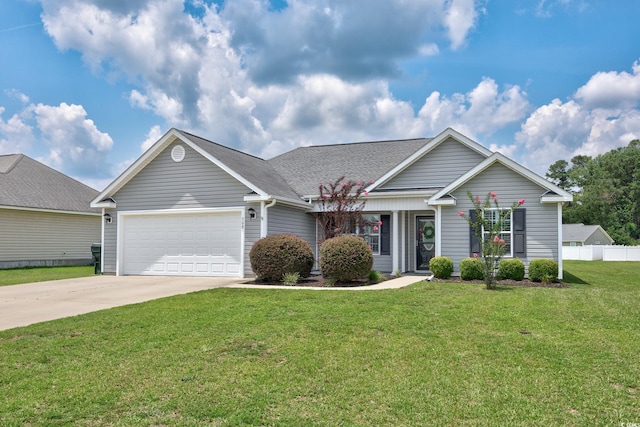 308 Millbrook Cir, Aynor, SC 29544 - view of front of home with driveway, an attached garage, and roof with shingles