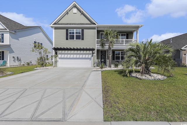 312 Cattle Drive Cir, Myrtle Beach, SC 29588 - view of front of home with a garage, concrete driveway, a balcony, and a front lawn