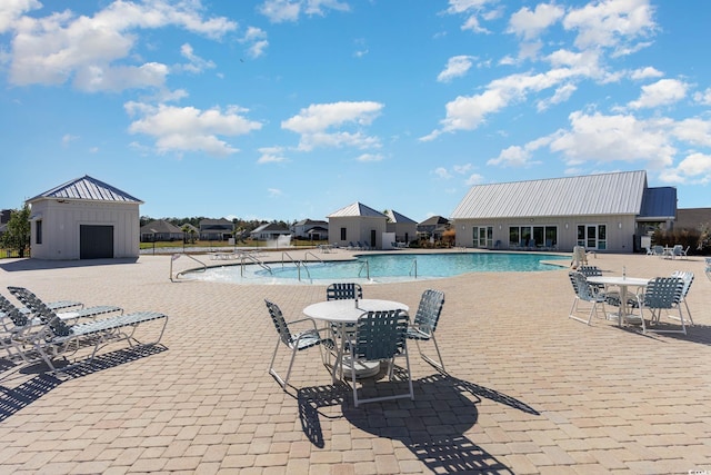 312 Cattle Drive Cir, Myrtle Beach, SC 29588 - community pool featuring a patio and an outdoor structure