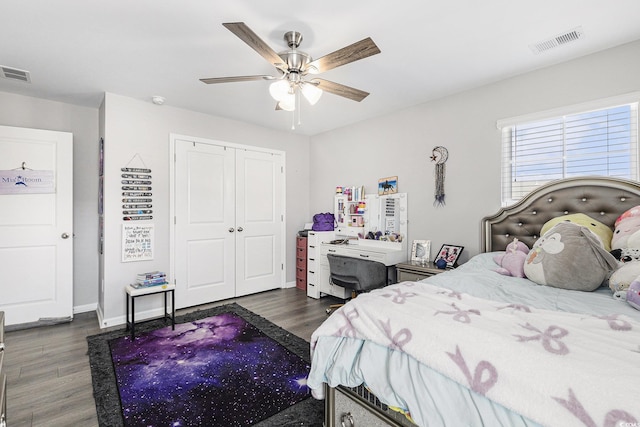312 Cattle Drive Cir, Myrtle Beach, SC 29588 - bedroom with dark wood-style flooring, a closet, and ceiling fan