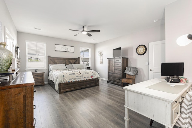 312 Cattle Drive Cir, Myrtle Beach, SC 29588 - bedroom featuring dark wood finished floors, ceiling fan, and an office area