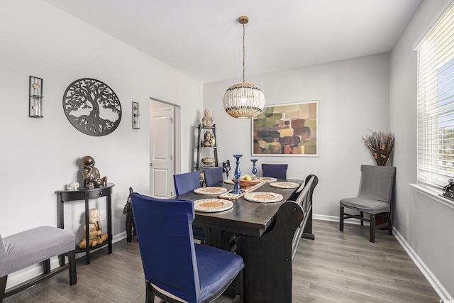 312 Cattle Drive Cir, Myrtle Beach, SC 29588 - dining area featuring a chandelier and light wood-type flooring