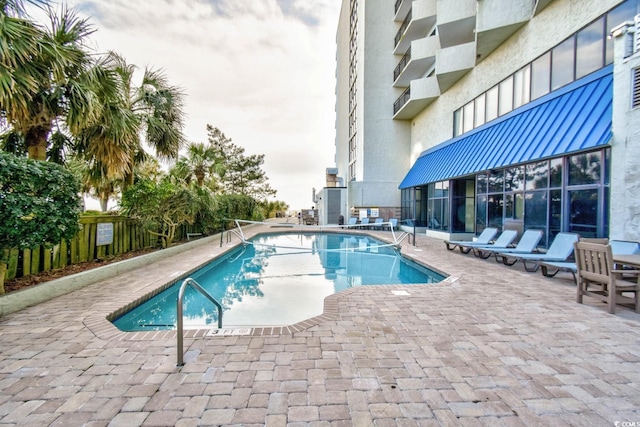 2001 S Ocean Blvd Unit 203, Myrtle Beach, SC 29577 - community pool featuring a patio area