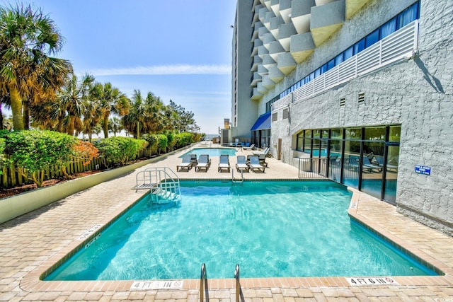 2001 S Ocean Blvd Unit 203, Myrtle Beach, SC 29577 - community pool featuring a patio