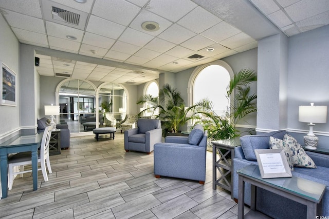 2001 S Ocean Blvd Unit 203, Myrtle Beach, SC 29577 - common area with a paneled ceiling and a wainscoted wall