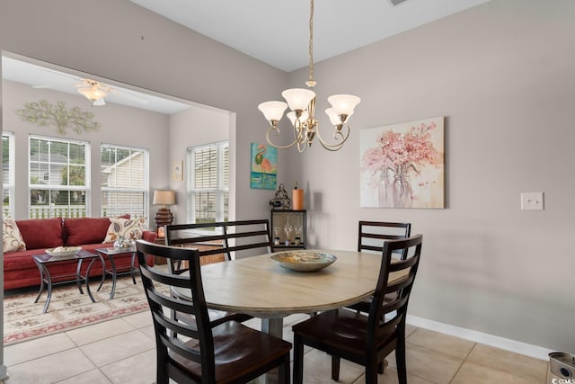 569 Ramblewood Cir, Little River, SC 29566 - dining room featuring light tile patterned floors, a chandelier, and ceiling fan