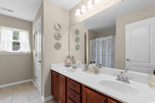 569 Ramblewood Cir, Little River, SC 29566 - bathroom with double vanity and tile patterned flooring