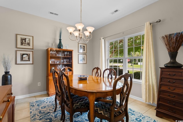 569 Ramblewood Cir, Little River, SC 29566 - dining space with a chandelier and light tile patterned flooring