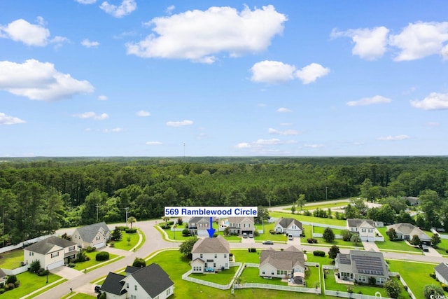 569 Ramblewood Cir, Little River, SC 29566 - aerial perspective of suburban area featuring a heavily wooded area