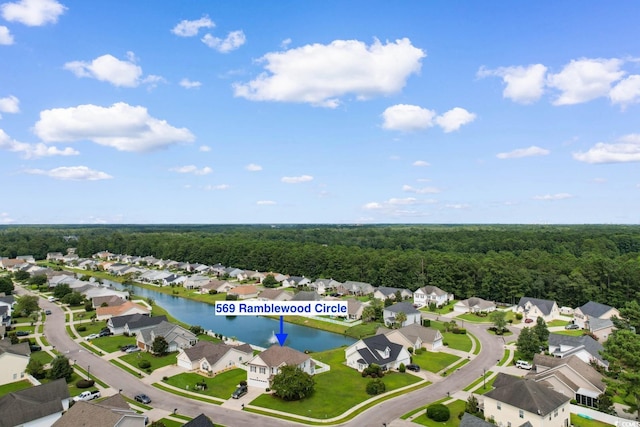 569 Ramblewood Cir, Little River, SC 29566 - aerial view of residential area featuring a heavily wooded area and a large body of water