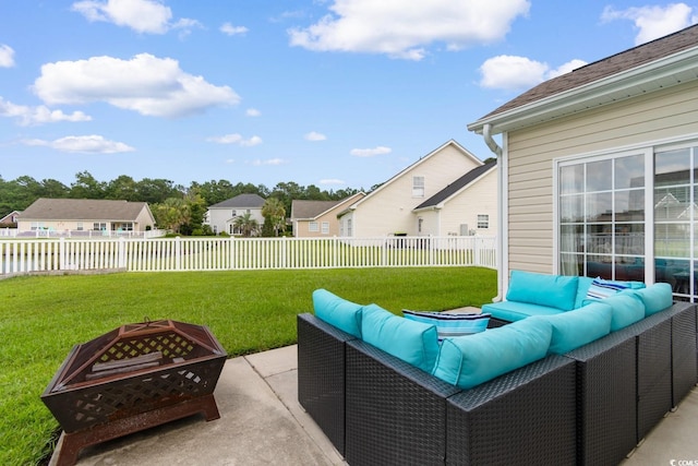 569 Ramblewood Cir, Little River, SC 29566 - fenced backyard with an outdoor living space with a fire pit and a patio