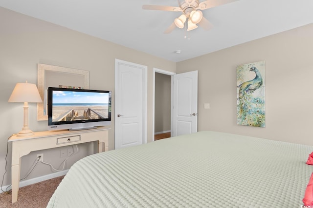 569 Ramblewood Cir, Little River, SC 29566 - bedroom with carpet floors and ceiling fan