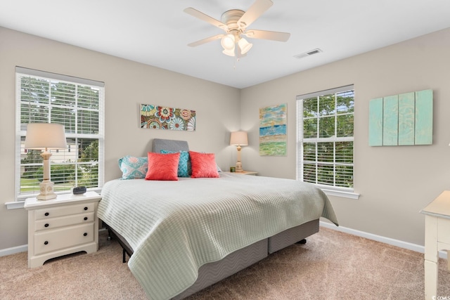 569 Ramblewood Cir, Little River, SC 29566 - bedroom with carpet and a ceiling fan